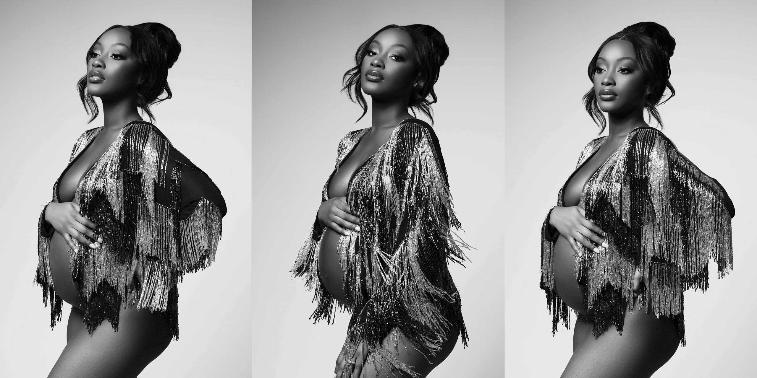 African American pregnant woman with a frilly jacket